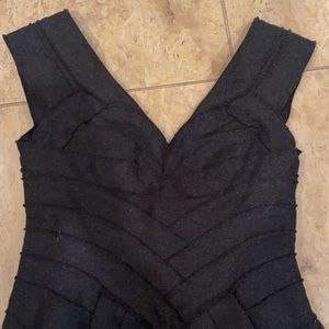 Herve Leger wool dark grey dress . Beautiful and chic for evening .